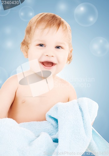 Image of baby with blue towel