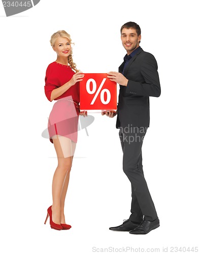 Image of man and woman with percent sign