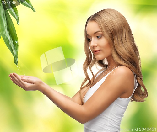 Image of woman holding something on the palms