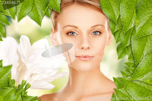 Image of beautiful woman with madonna lily