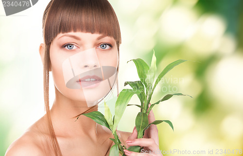 Image of woman with sprout