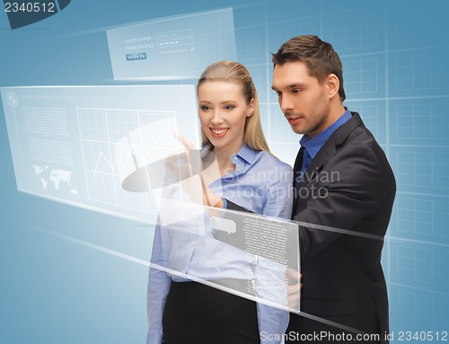 Image of man and woman working with virtual touch screens