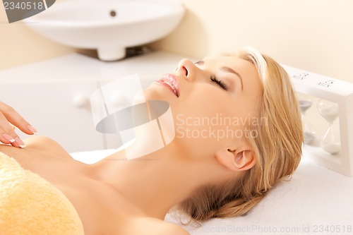 Image of beautiful woman in spa salon