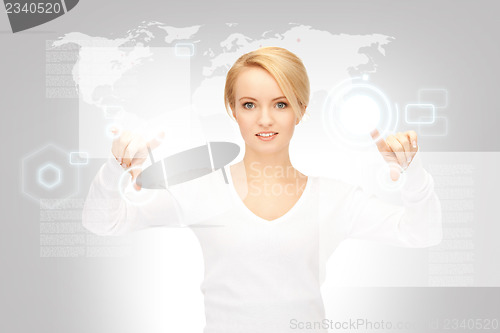 Image of businesswoman working with touch screen