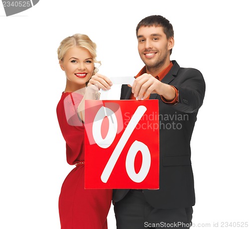 Image of man and woman with shopping bag