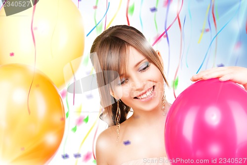 Image of happy teenage girl with balloons