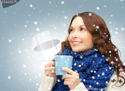 Image of woman with blue mug