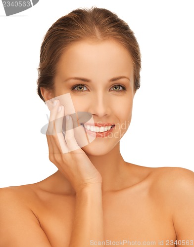 Image of face and hands of beautiful woman