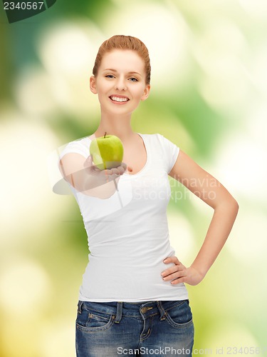 Image of teenage girl with green apple