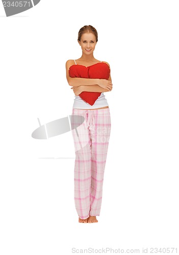 Image of woman in cotton pajamas with big heart