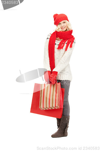 Image of young girl with shopping bags