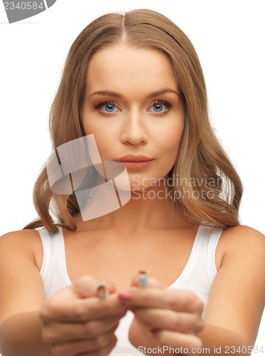 Image of woman with broken cigarette