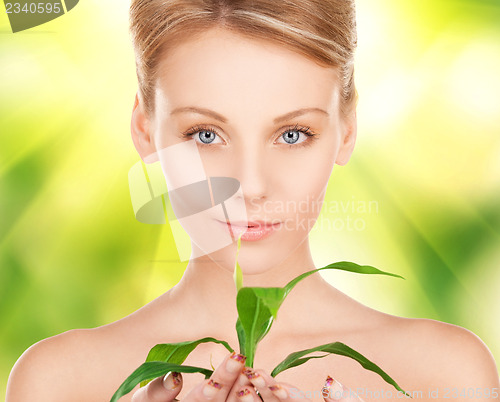 Image of woman with sprout