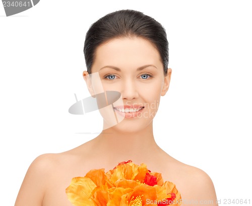 Image of woman with red flowers
