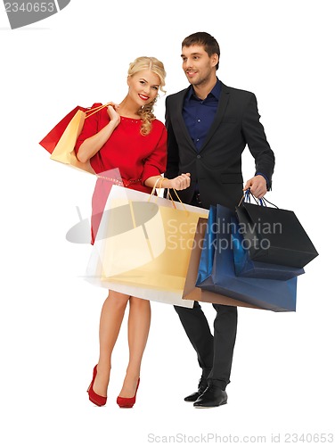 Image of man and woman with shopping bags