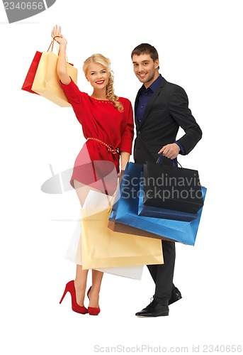 Image of man and woman with shopping bags