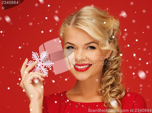 Image of lovely woman in red dress with snowflake