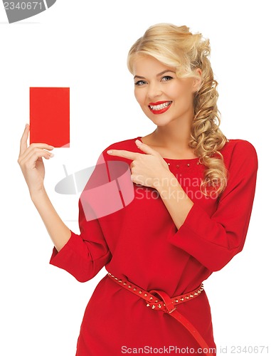 Image of lovely woman in red dress with note card
