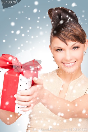 Image of happy woman with gift box