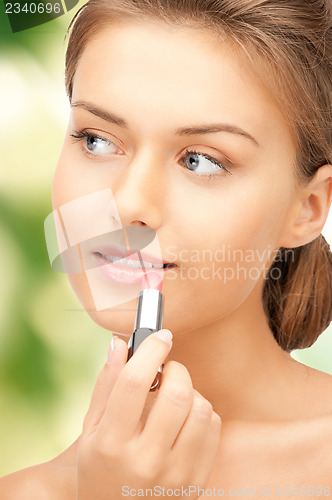 Image of beautiful woman with lipstick