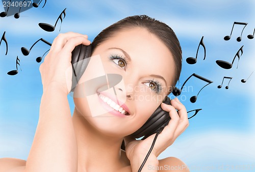 Image of happy woman in headphones