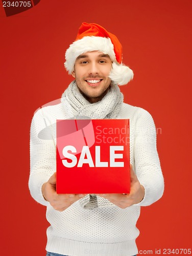 Image of handsome man in christmas hat