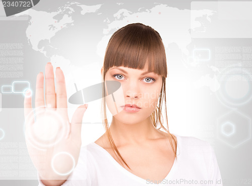 Image of businesswoman working with touch screen