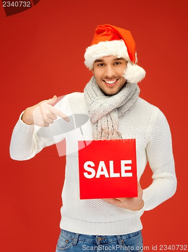 Image of handsome man in christmas hat