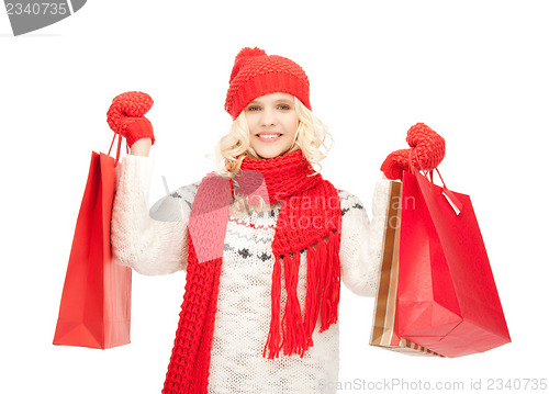 Image of young girl with shopping bags