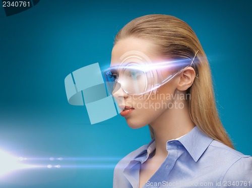 Image of businesswoman with digital glasses