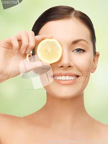 Image of woman with lemon slice