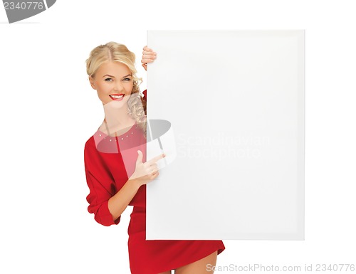 Image of lovely woman in red dress with blank board