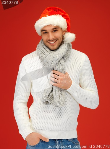 Image of handsome man in christmas hat