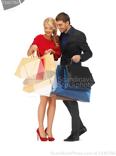 Image of man and woman with shopping bags