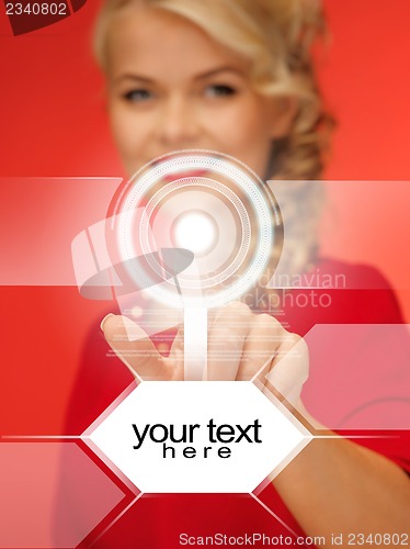 Image of woman in red dress pressing virtual button