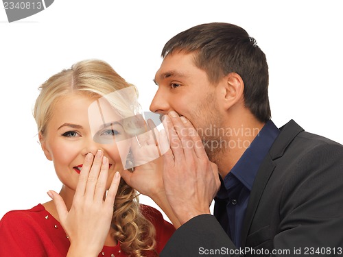 Image of man and woman spreading gossip