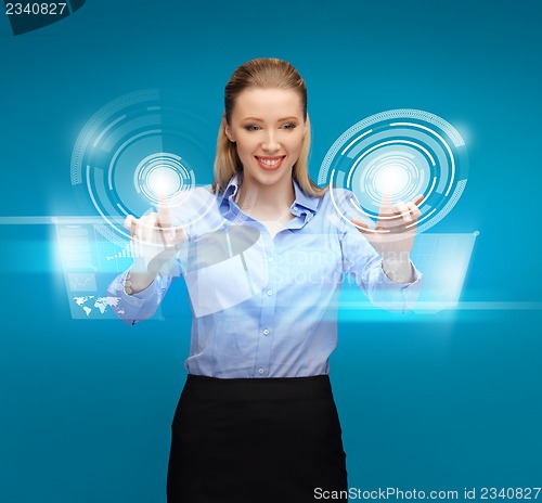 Image of woman working with virtual screens
