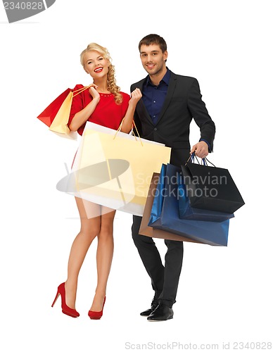 Image of man and woman with shopping bags