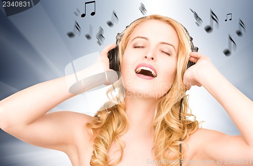 Image of happy woman in headphones