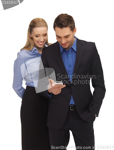 Image of man and woman reading sms