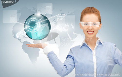 Image of virtual earth globe on the palm