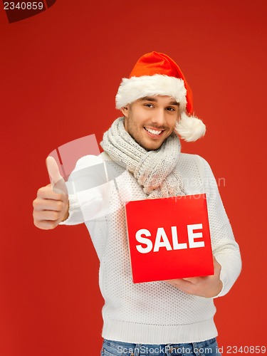 Image of handsome man in christmas hat