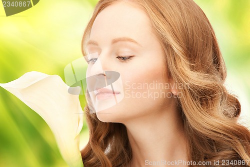 Image of beautiful woman with calla flower