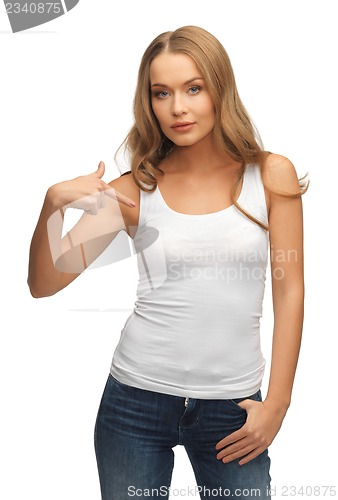 Image of calm and serious woman in blank white t-shirt