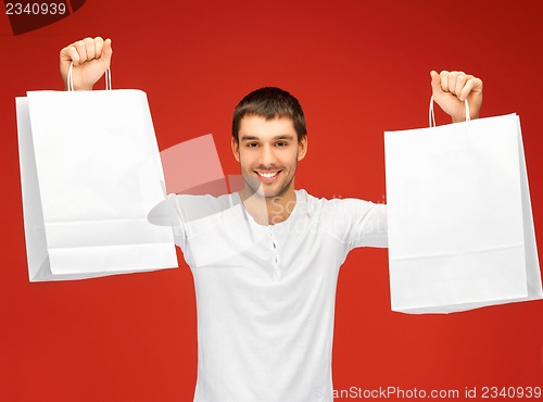 Image of man with shopping bags