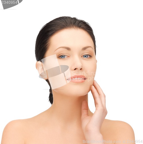 Image of face and hands of beautiful woman