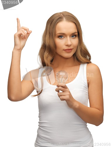 Image of woman with energy saving bulb