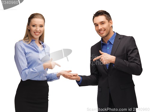 Image of man and woman showing something on the palms