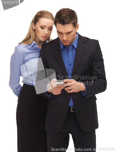 Image of man and woman reading sms