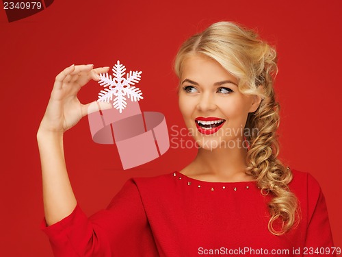 Image of lovely woman in red dress with snowflake